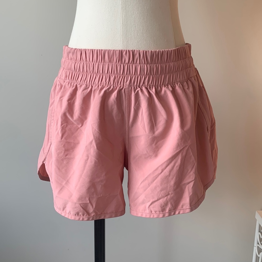 Pink lulu track that size 12 high rise short